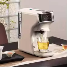 Cafetiere a capsules blanche verse thé