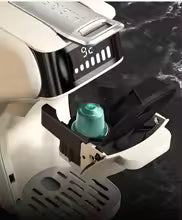 Cafetiere a capsules montrant capsule