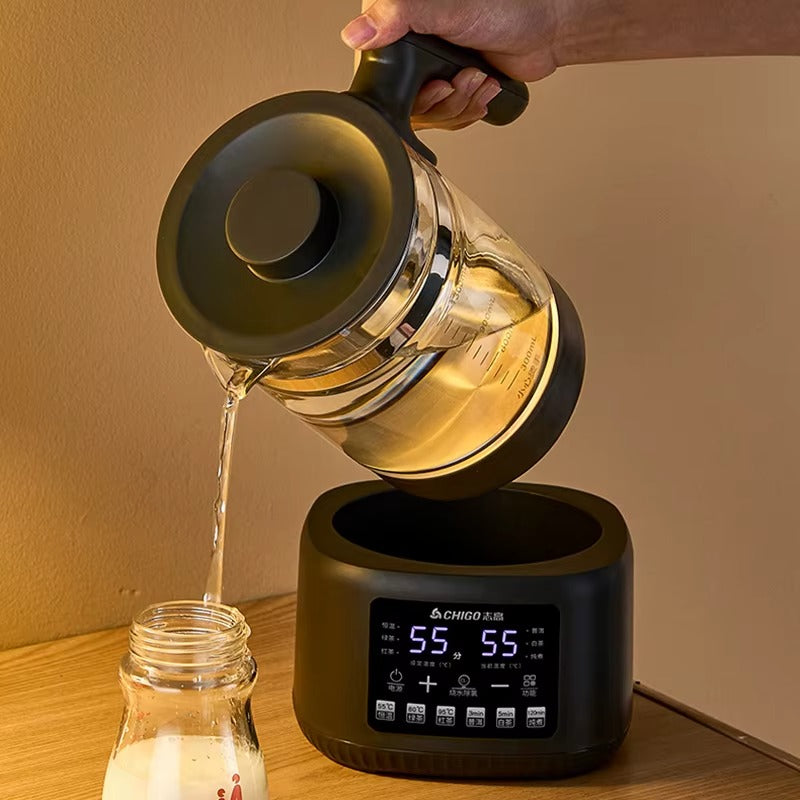Bouilloire electrique Thermostat Réglable verse eau dans un biberon