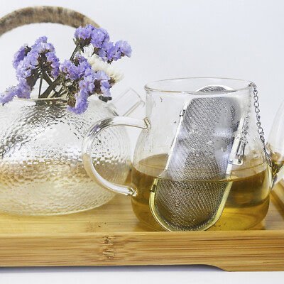 Boule à thé Infusion Premium dans théière avec fleurs