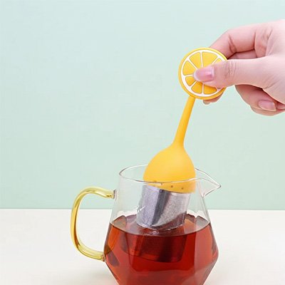 Boules à thé Amusant Coloré ornge dans tasse