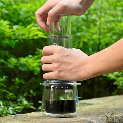 Cafetière portatif Extraction Parfaite en utilisation