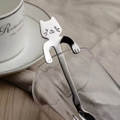 Cuillere a cafe Élégance Féline appuyé sur tasse