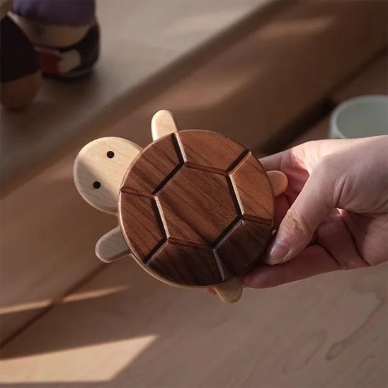 Dessous de verre - Tortue en main
