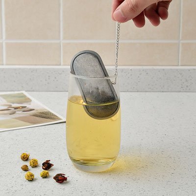 Filtre a the Infusion Premium dans un verre à thé