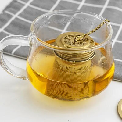 Infuseur a the Elegant infuse dans théière