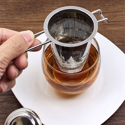 Infuseur à tisane Design Premium avec une tasse et une soucoupe