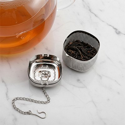 Infuseur Éco Saveurs ouvert sur table