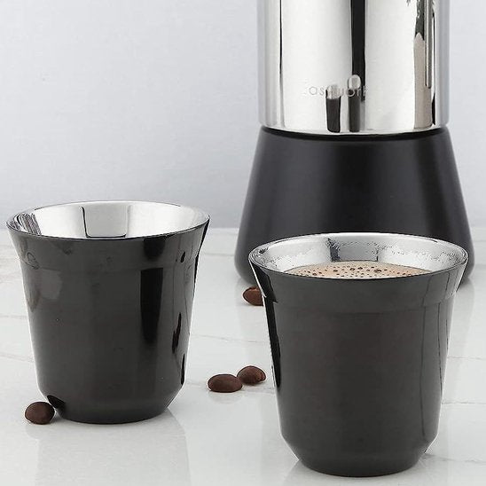 Tasse double paroi ÉcoCafé en paire devant une cafetière