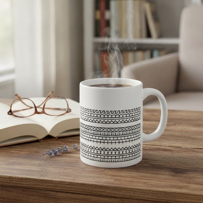 Tasse pour café Équioxe sur table avec livre