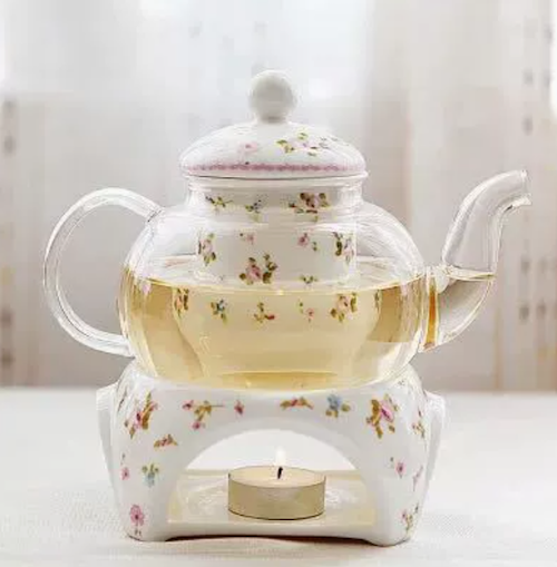 Théière avec infjuseur Porcelaine Vintage sur table