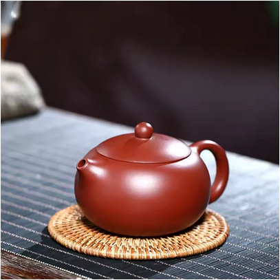 Théière céramique Yixing Artisanale sur napperon