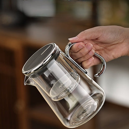 Théière infuseur PureBoil vide tenue en main